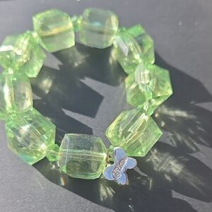 Luminous Green Beaded Bracelet with Butterfly Charm